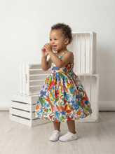 Load image into Gallery viewer, Child wearing a pure cotton and colorful floral wtih Jungle animals dress Quirky print