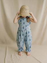 Charger l'image dans la galerie, Child wearing a blue Jumpsuit with blue bird pattern which is made with the Dabu technique. Cotton fabric. comfortable for the child to run and play