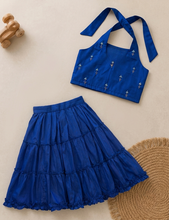 Charger l'image dans la galerie, Royal blue cotton halter neck lehenga set for girls with embroidered blouse and ankle-length tiered skirt.