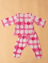 Charger l'image dans la galerie, Baby wearing a Jhabla  set with hearts  printed on Pink Shibori  background, pure cotton print and extremely soft on babys skin 
