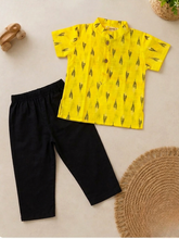 Charger l'image dans la galerie, Boy wearing yellow Ikat print short kurta with black pants kids ethnic wear set
